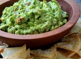 Basil and Sun-Dried Tomato Guacamole with Parmesan Tortilla Chips