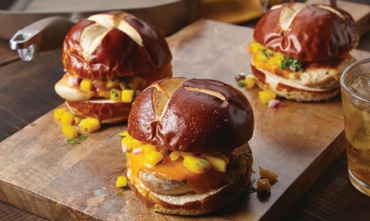 Grilled Chicken Sandwich with Mango Salsa on Pretzel Roll