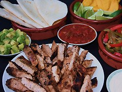 Pork Fajitas with Mango, Peppers, & Onions