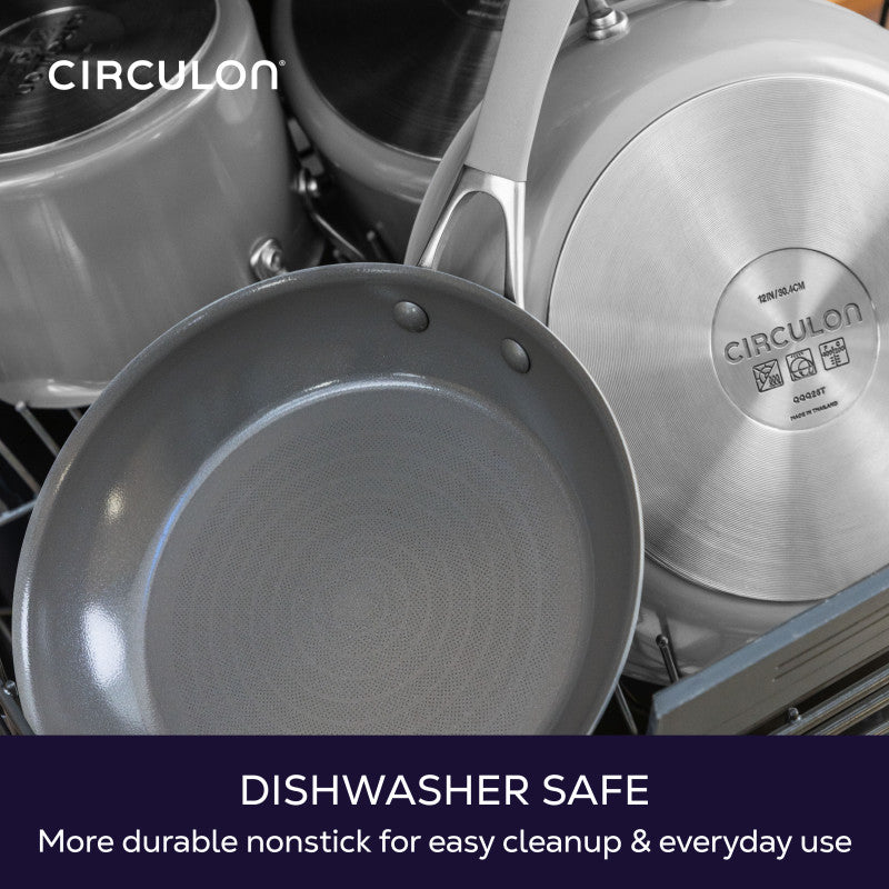 Dishwasher safe, more durable nonstick for easy cleanup and everyday use: gray Circulon frying pan and pots loaded in a dishwasher