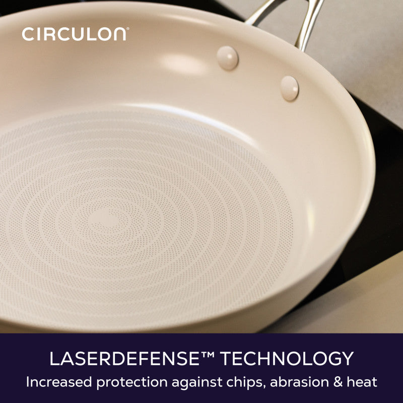 LaserDefense technology, increased protection against chips, abrasion and heat: close-up of the dotted circle pattern inside a taupe frying pan