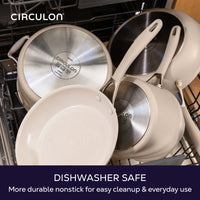 Dishwasher safe, more durable nonstick for easy cleanup and everyday use: taupe pots and pans in a dishwasher rack