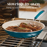 Stovetop-to-oven, pans and lids oven safe to 400°F: marine blue frying pan with two seared steaks on an oven rack