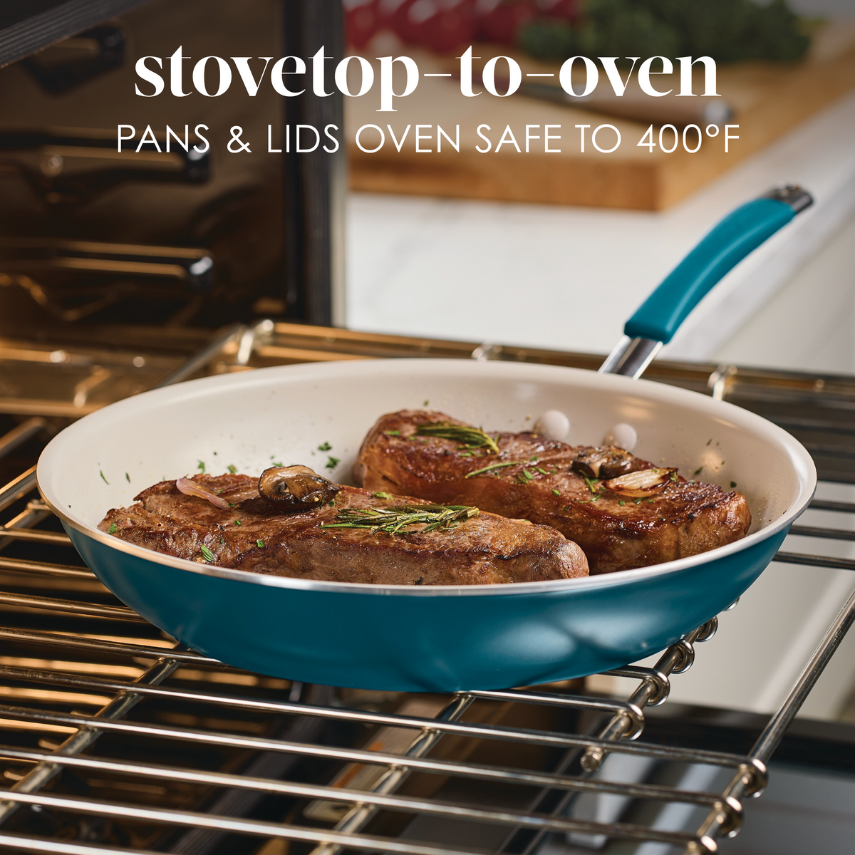 Stovetop-to-oven, pans and lids oven safe to 400°F: marine blue frying pan with two seared steaks on an oven rack