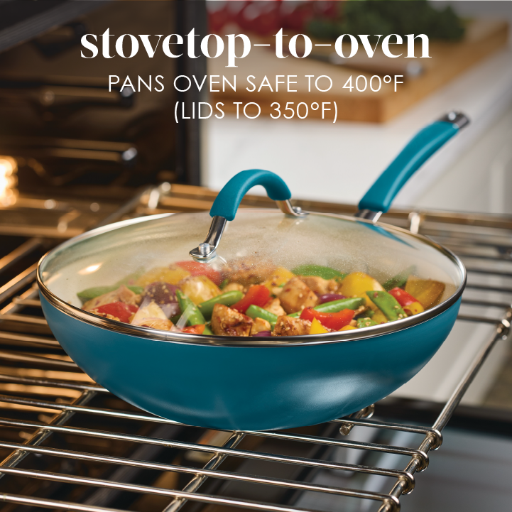 Stovetop-to-oven, pans oven safe to 400°F (lids to 350°F): covered marine blue stir fry pan of chicken and vegetables on an oven rack