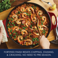 Fortified finish resists chipping, staining and cracking, no need to pre-season: overhead view of shrimp, sausage and pea rice in a red cast iron skillet