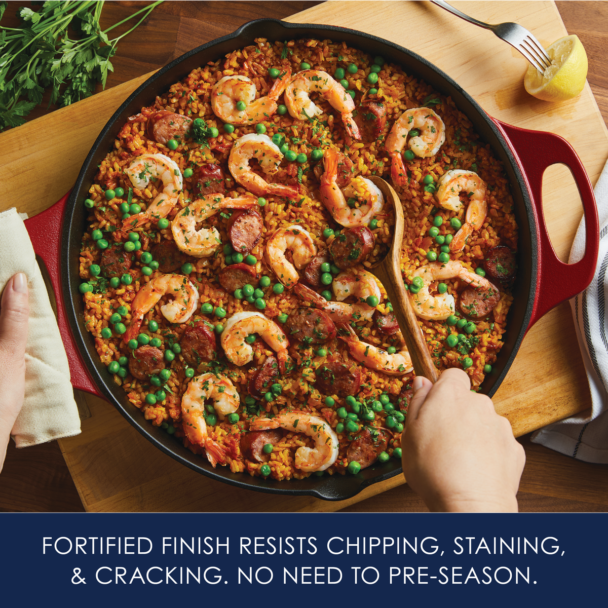 Fortified finish resists chipping, staining and cracking, no need to pre-season: overhead view of shrimp, sausage and pea rice in a red cast iron skillet