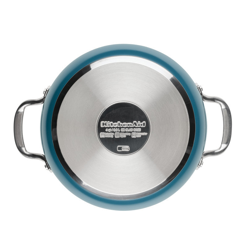 Bottom view of the agave blue casserole showing the stainless steel base stamped with the KitchenAid logo