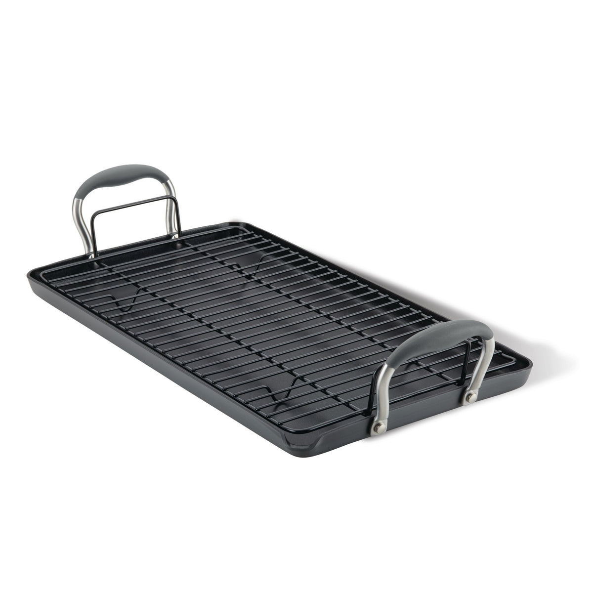 Side angle view of the double burner griddle with wire rack and moonstone handle grips