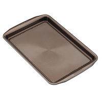 Chocolate rectangular baking sheet with concentric circles across the surface