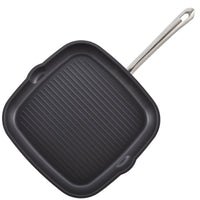 Top view of the 11-inch square grill pan with its ridged nonstick cooking surface and pour spouts