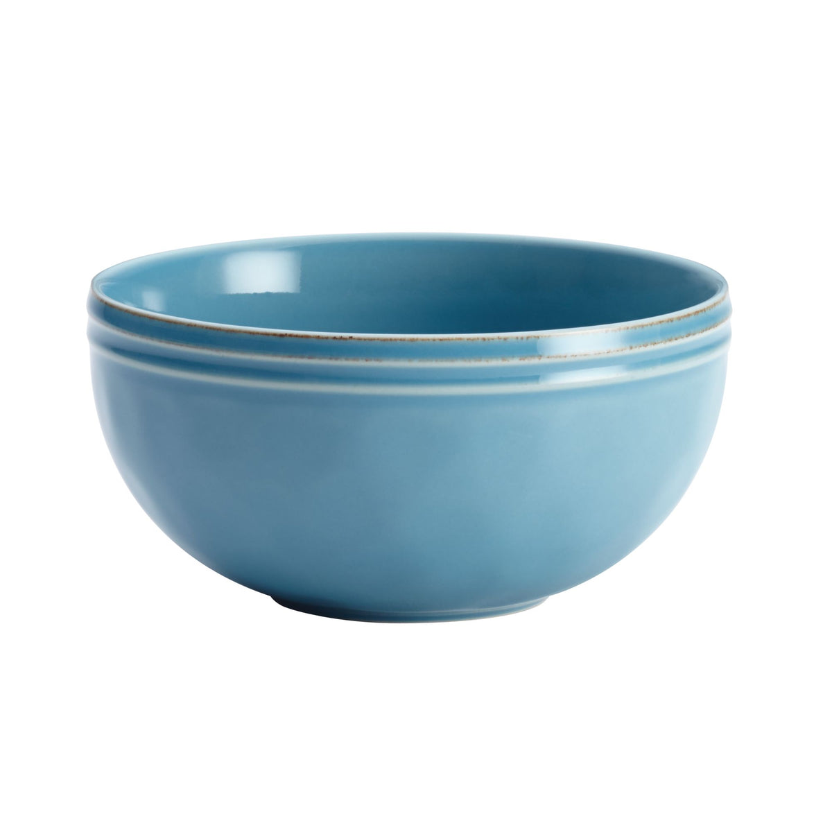 Side view of an agave blue bowl with a ridged, speckled rim