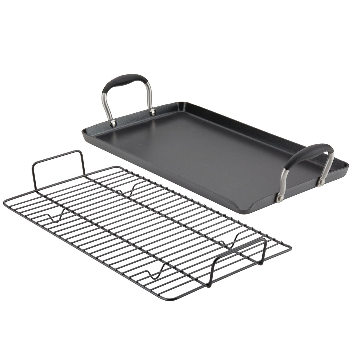 Dark gray double burner griddle with black handle grips beside its wire rack